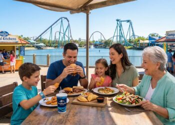 A family enjoying a wide variety of Cuisine Options at SeaWorld Orlando including the All-Day Dining Deal and Shark’s Underwater Grill