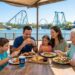 A family enjoying a wide variety of Cuisine Options at SeaWorld Orlando including the All-Day Dining Deal and Shark’s Underwater Grill